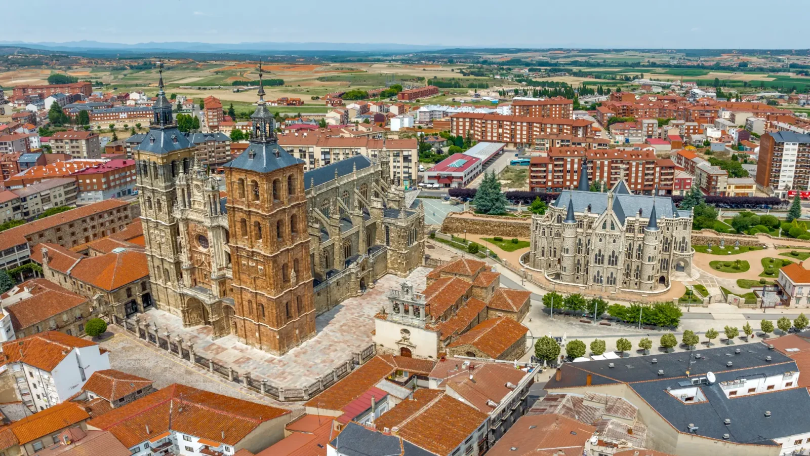 An aerial view of Astorga, León, Spain, with the cathedral and Gaudí palace among the rooftops