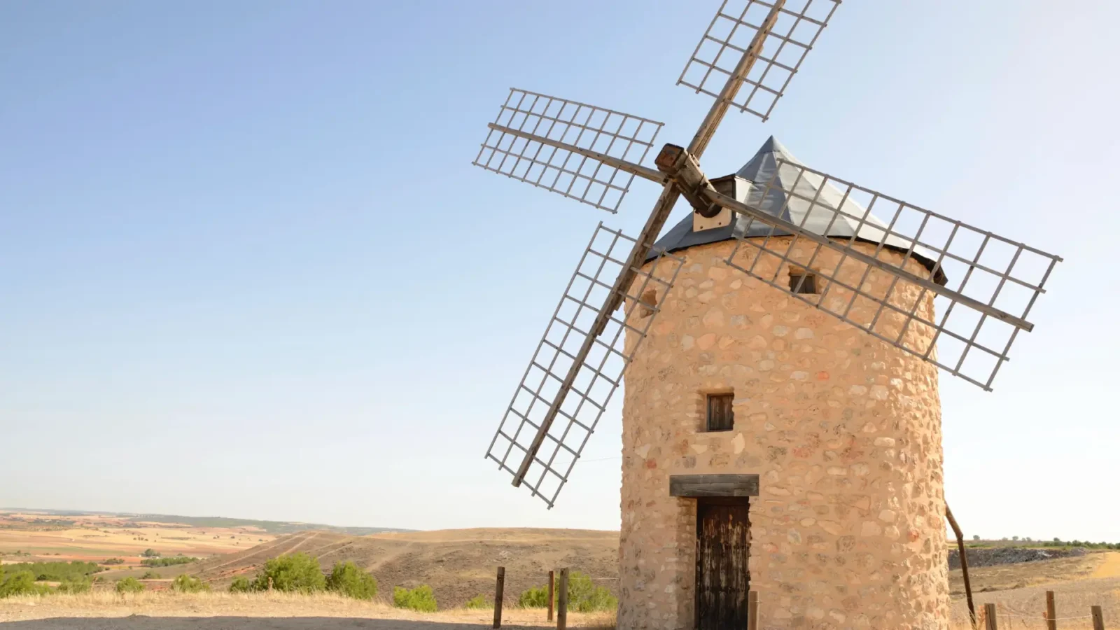 Stone windmill in countryside of Belmonte, Cuenca, Castilla-La Mancha, Spain