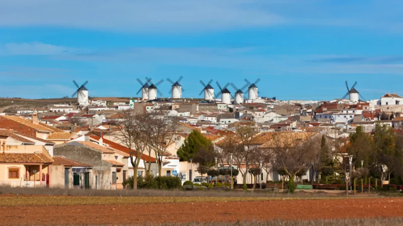 The white windmills above the town of Campo de Criptana, Ciudad Real, Castilla-La Mancha, Spain