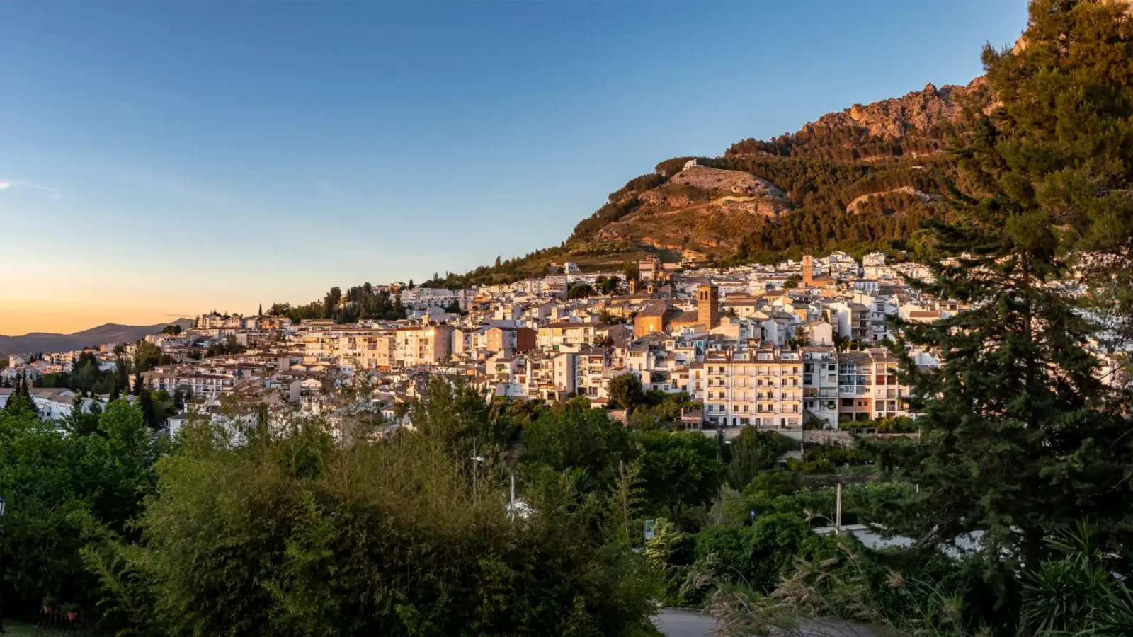 Cazorla old town in golden evening light, with the sierra behind, Jaén, Andalucía, Spain