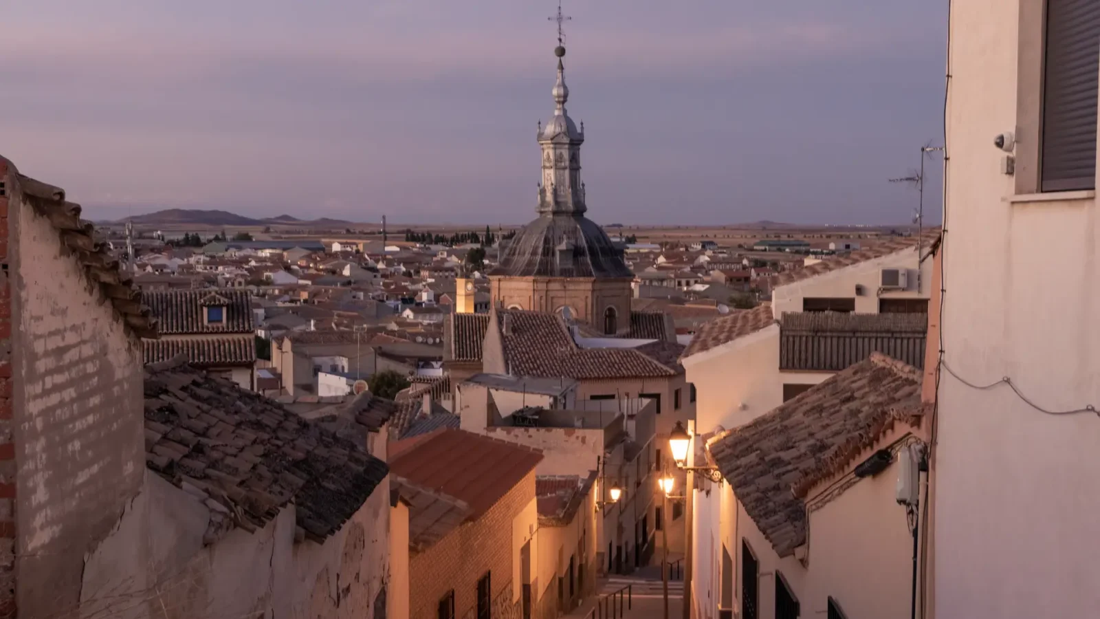 A quiet old-town street in Consuegra, Castilla-La Mancha, Spain