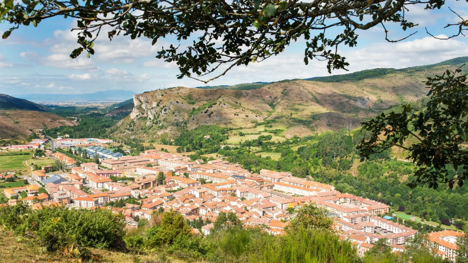Ezcaray set in its valley below the Sierra de la Demanda, La Rioja, Spain