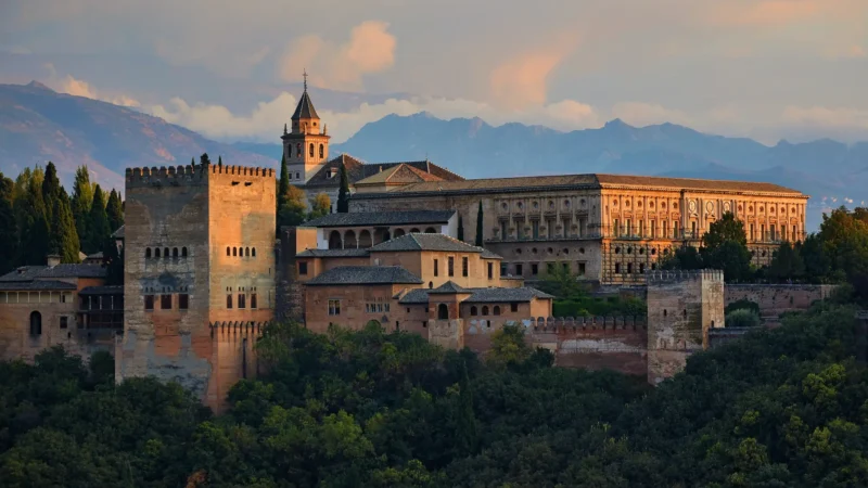 The Alhambra palace-fortress above Granada at sunset, Andalucía, Spain