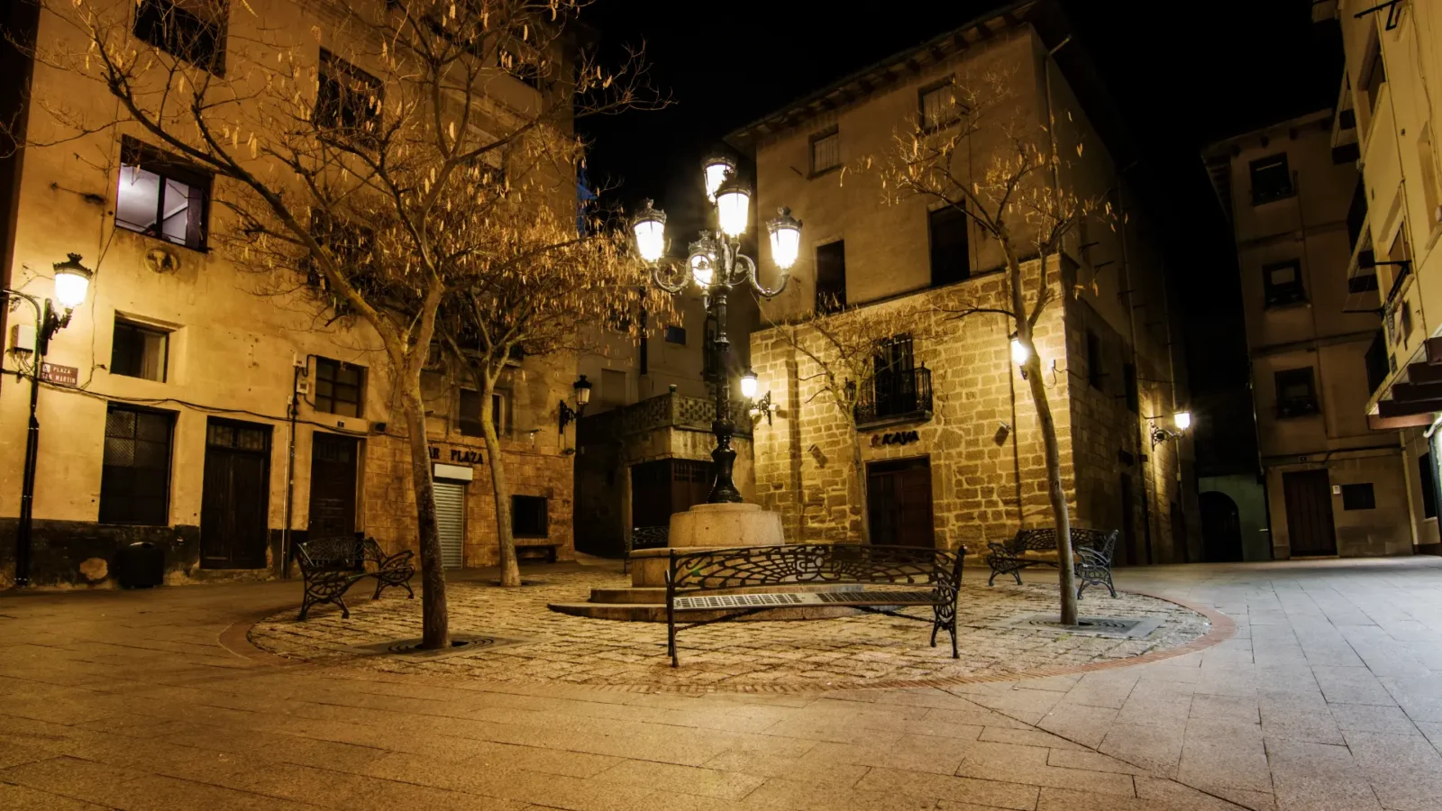 Lamplit old-town square at night in Haro, La Rioja, Spain