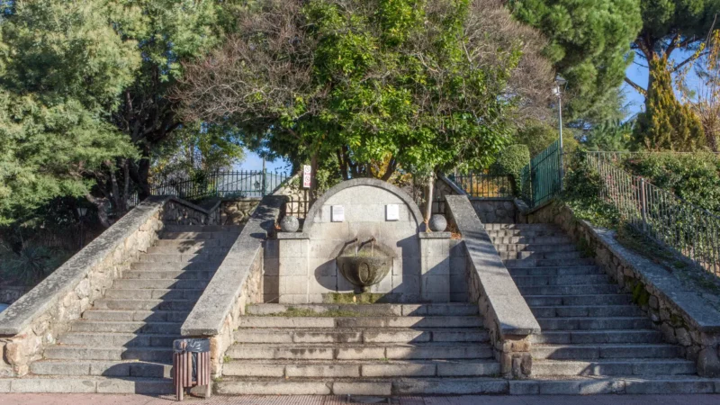Monumental fountain and staircase at an entrance to La Aliseda park in Jarandilla de la Vera, Extremadura, Spain