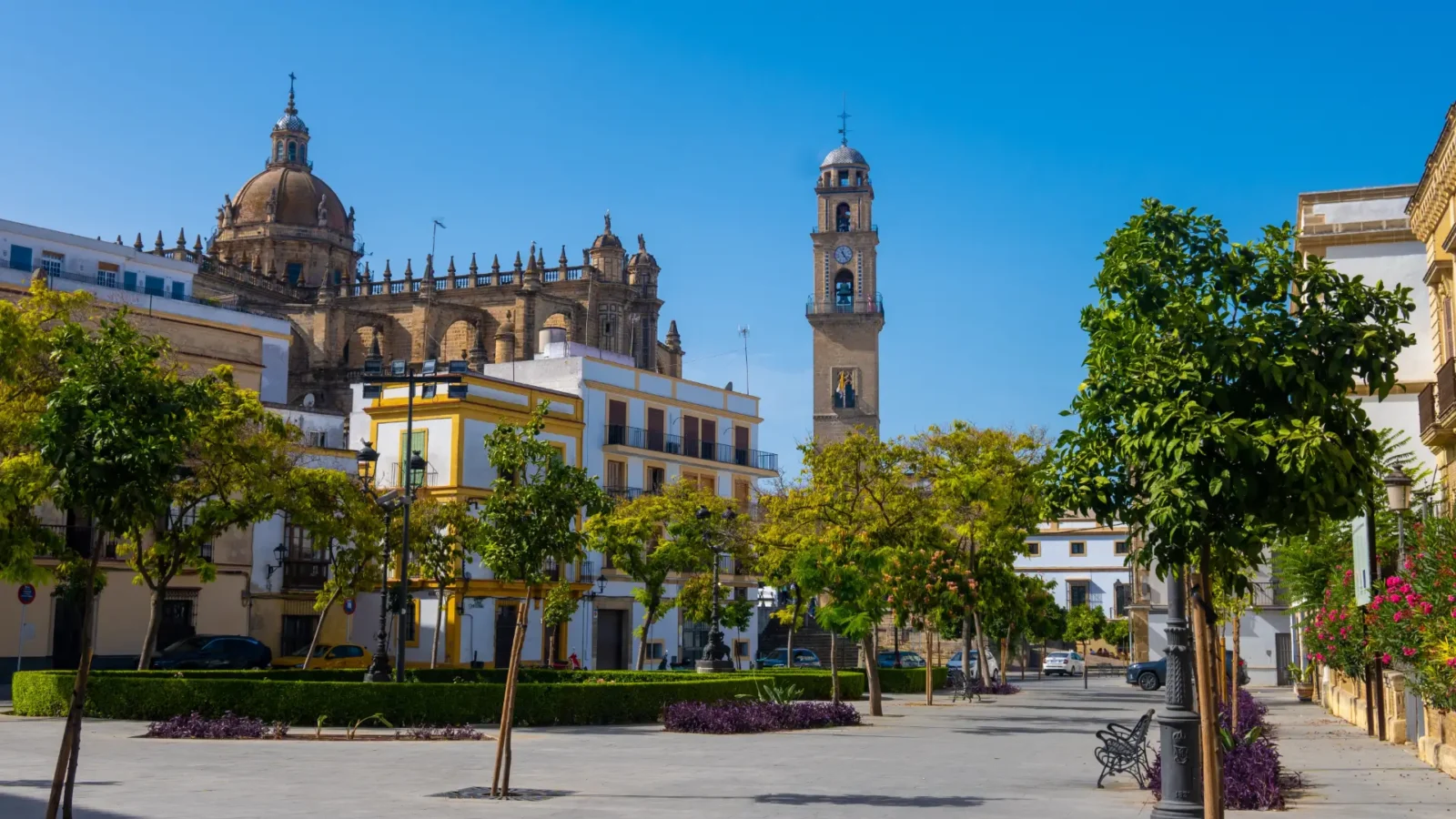 A square in Jerez de la Frontera with the cathedral tower behind, Andalusia, Spain