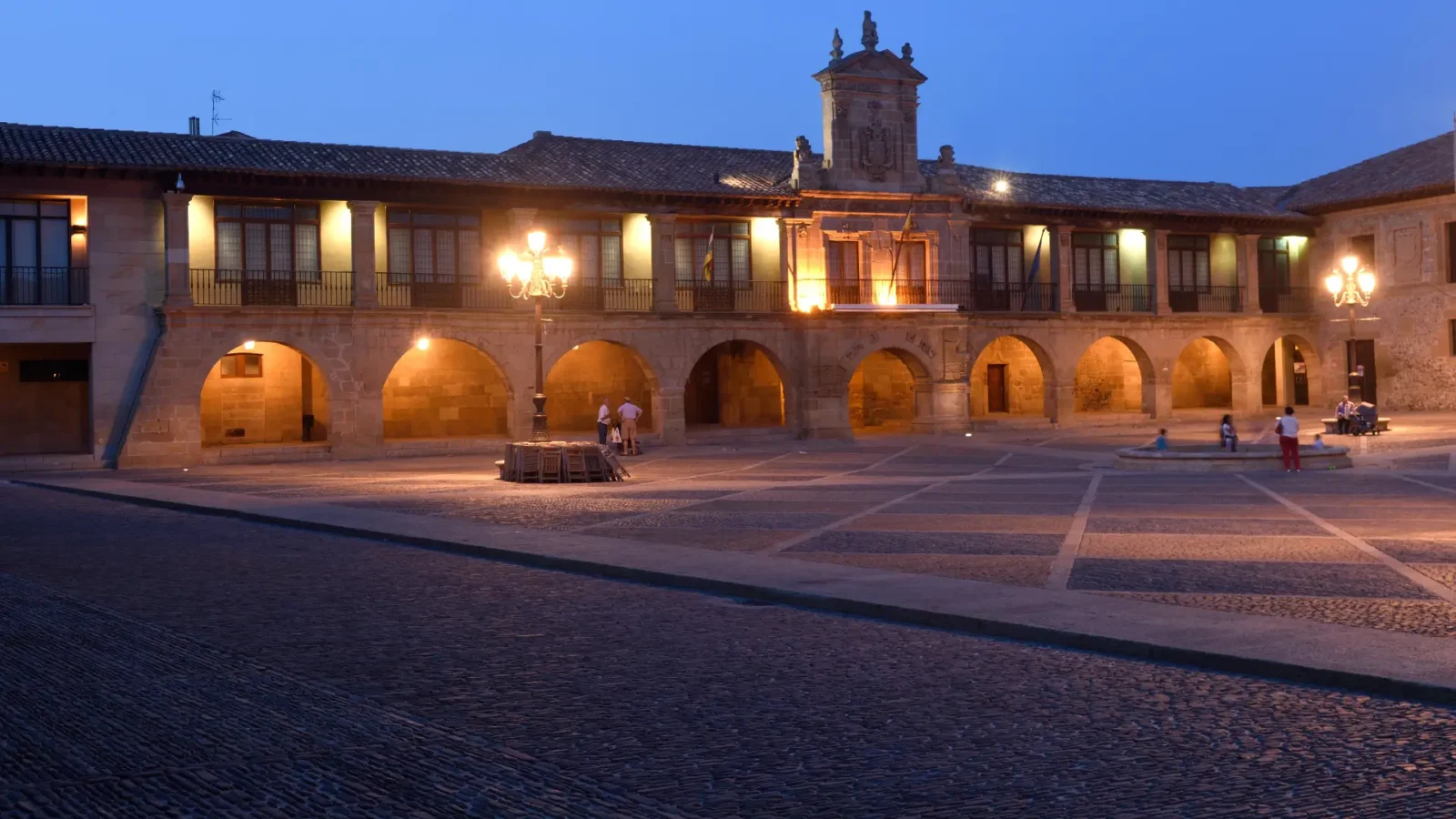 Arcaded main square of Santo Domingo de la Calzada at dusk, La Rioja, Spain