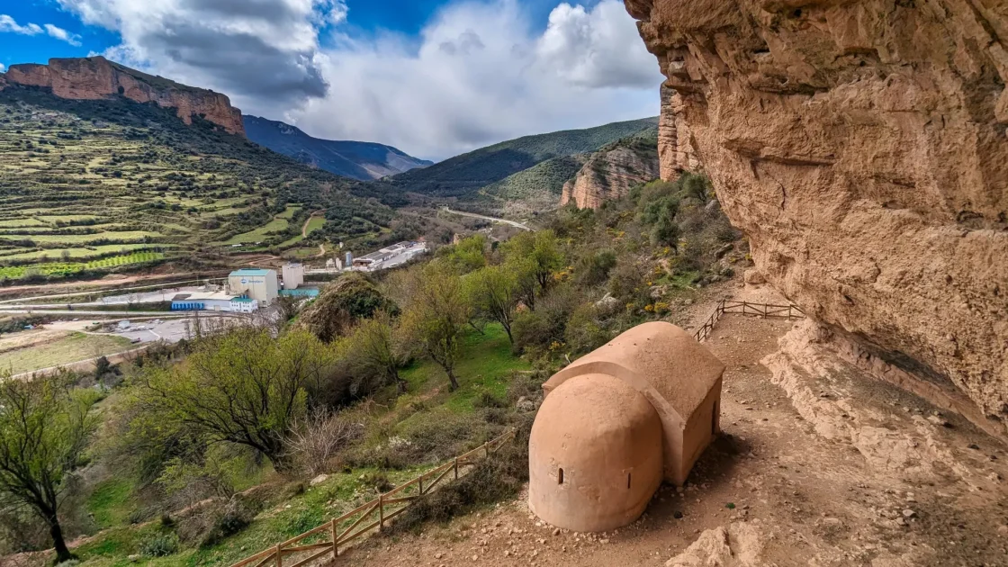 Hermitage of San Esteban under the overhanging cliff above Viguera, La Rioja, Spain