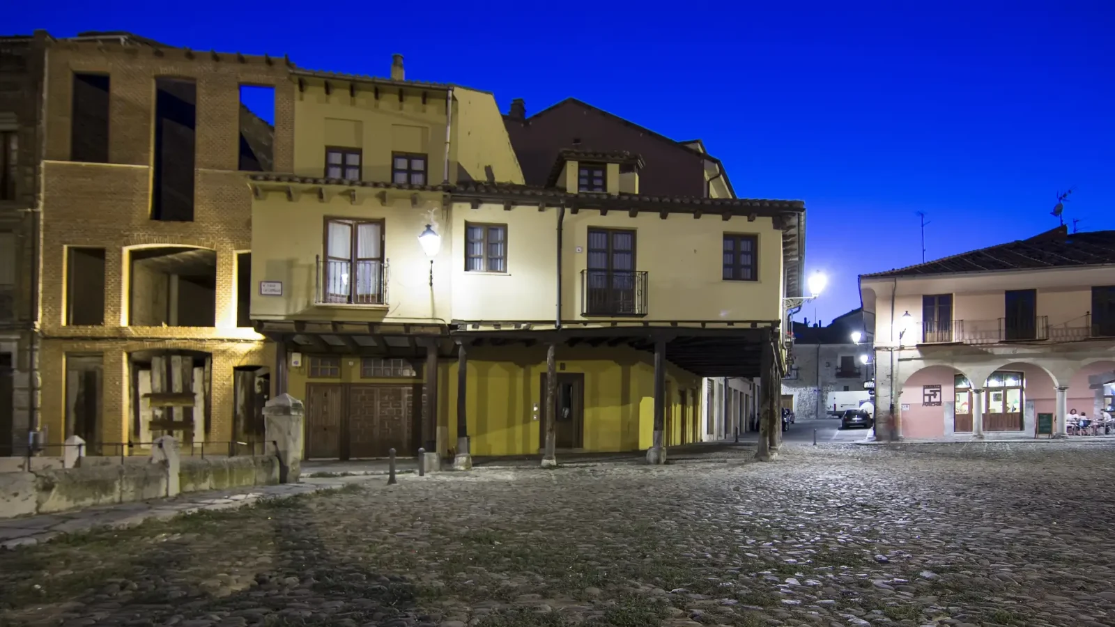The timber-arcaded Plaza del Grano at dusk in León, Castilla y León, Spain