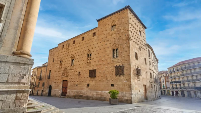 The shell-covered façade of the Casa de las Conchas in Salamanca, Castilla y León, Spain