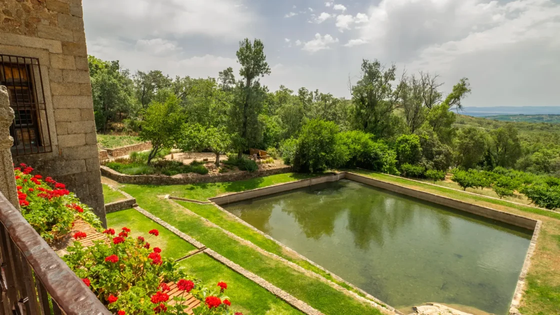 The garden pond and valley view at the Monastery of Yuste near Cuacos de Yuste, Extremadura, Spain