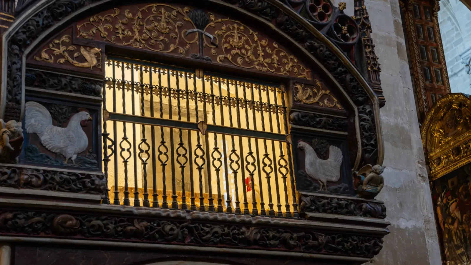 The Gothic henhouse with its live rooster and hen inside the cathedral of Santo Domingo de la Calzada, La Rioja, Spain