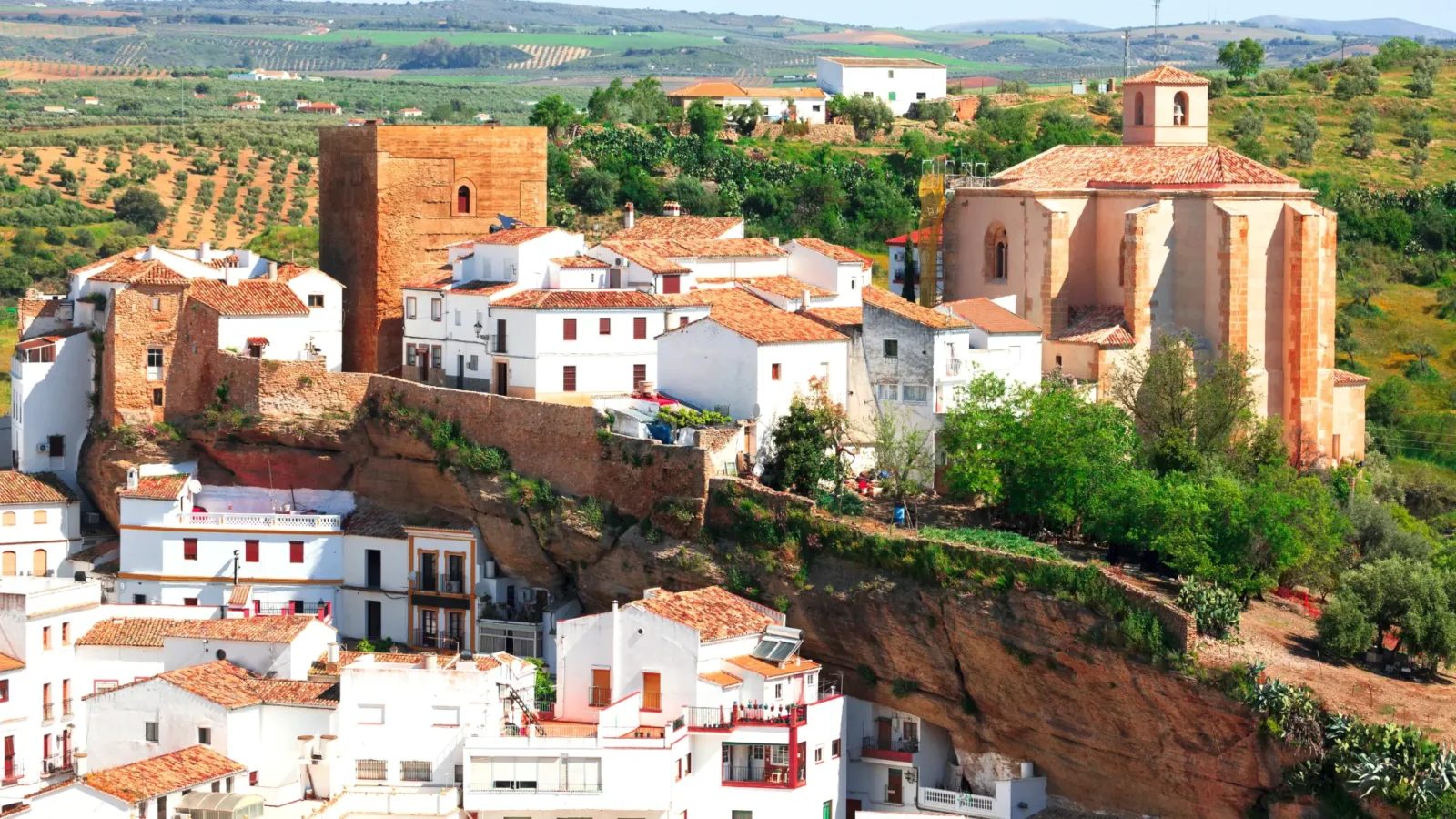 Quiet townscape with the tower in Setenil de las Bodegas, Andalucía, Spain