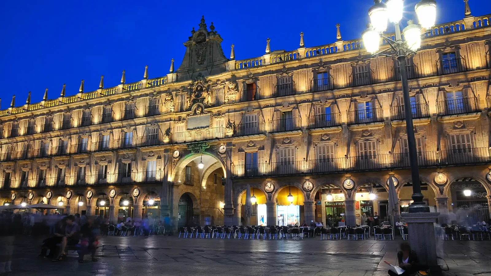 The Plaza Mayor glowing at blue hour on the Three Walled Cities route, Salamanca, Castilla y León, Spain