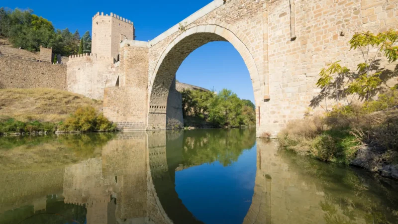 The Roman-founded Puente de Alcántara over the River Tagus in Toledo, Castilla-La Mancha, Spain