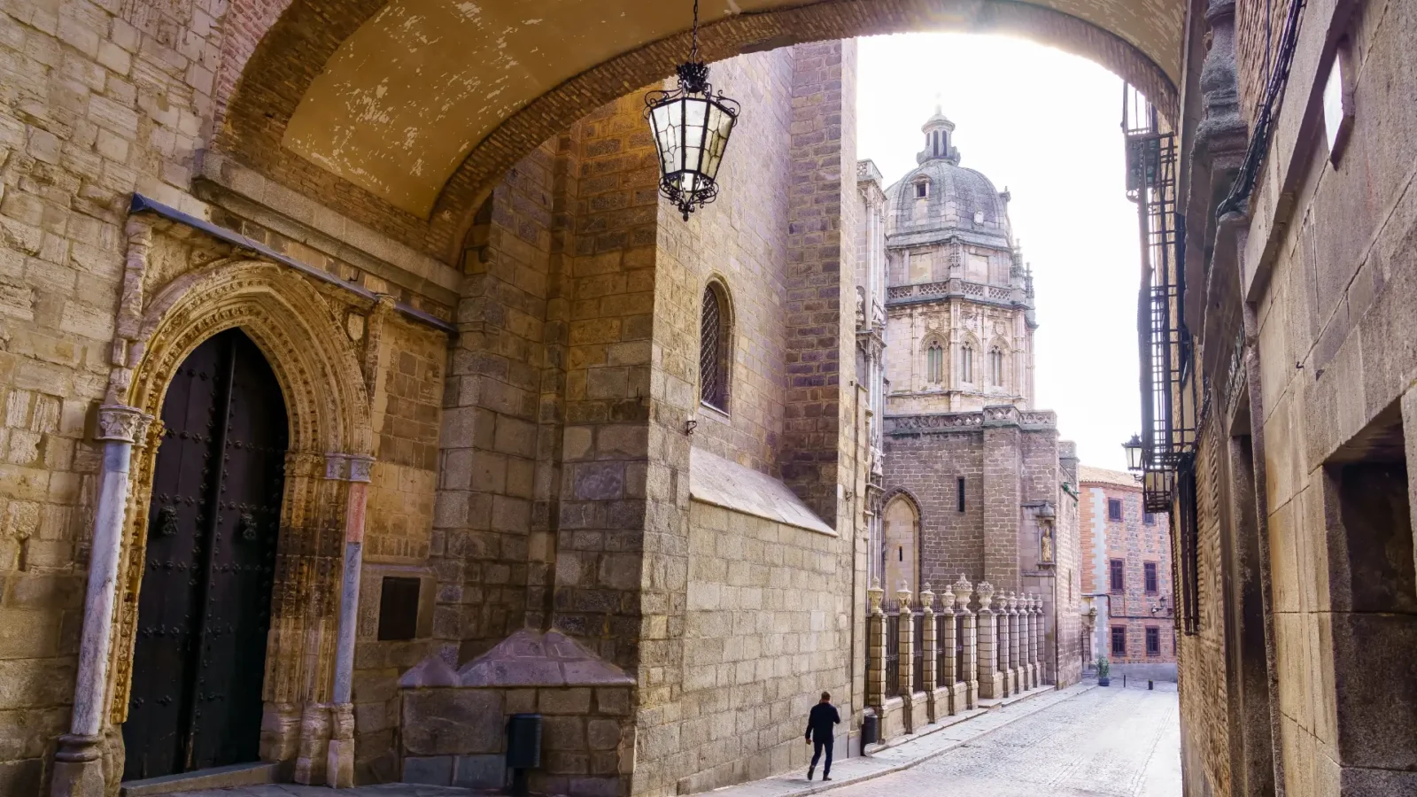 A quiet street in Toledo's old town leading to the cathedral, Castilla-La Mancha, Spain