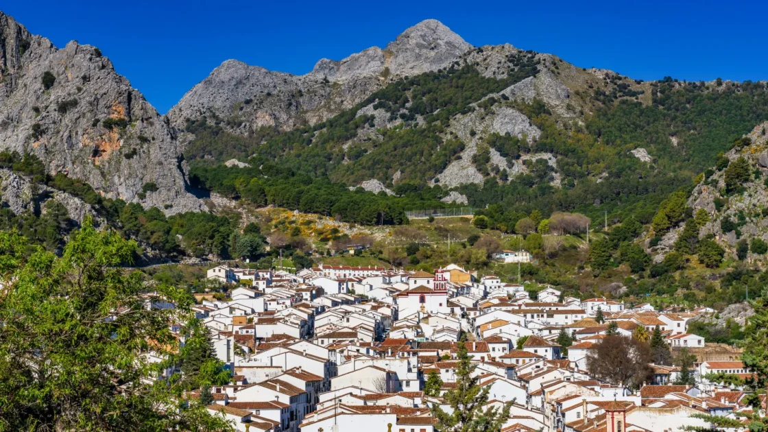 The white village of Grazalema below the peaks of its natural park, Andalucía, Spain