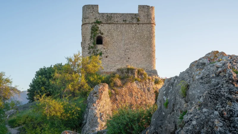 The castle keep, Torre del Homenaje, on its rock above Zahara de la Sierra, Cádiz, Andalucía, Spain